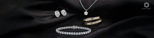 Lab grown diamond jewelry capsule wardrobe with oval stud earrings, solitaire pendant, tennis bracelet, and gold rings by Ouros Jewels