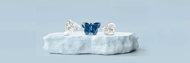  image showing antique-shaped lab-grown diamonds cut in the shapes of a duck, butterfly, and horse