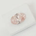 Oval Shape Pink Diamond on White Cloth 