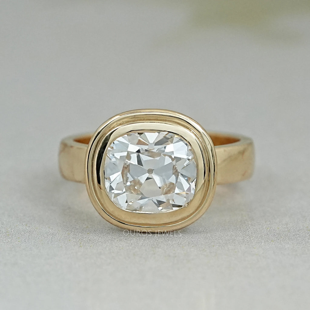 top view of old mine cushion cut lab diamond bezel solitaire engagement ring