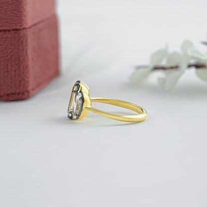 Bague halo en émeraude taille ancienne serti clos avec entourage diamants