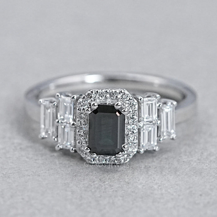 front view of black emerald-cut diamond solitaire accent halo engagement ring