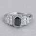 front view of black emerald-cut diamond solitaire accent halo engagement ring