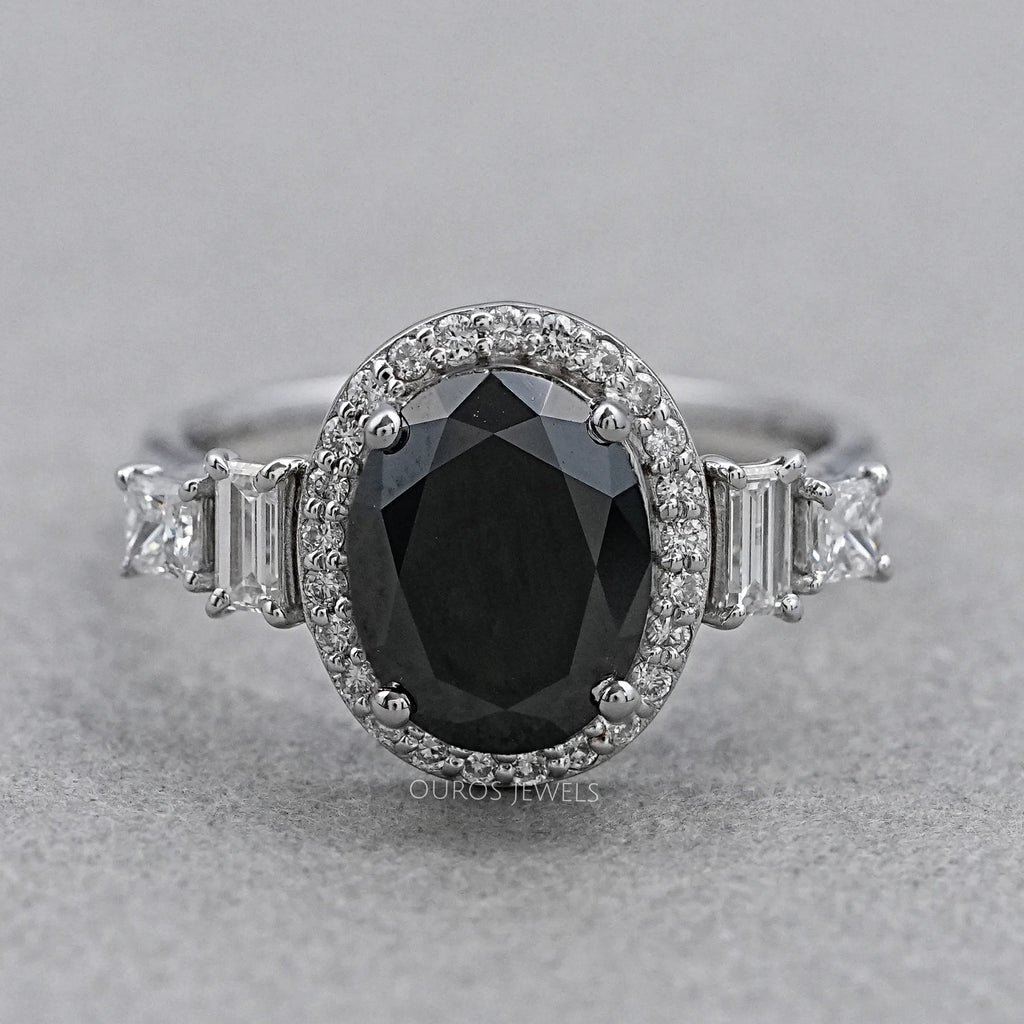 front view of black oval-cut lab diamond halo 5-stone colored engagement ring