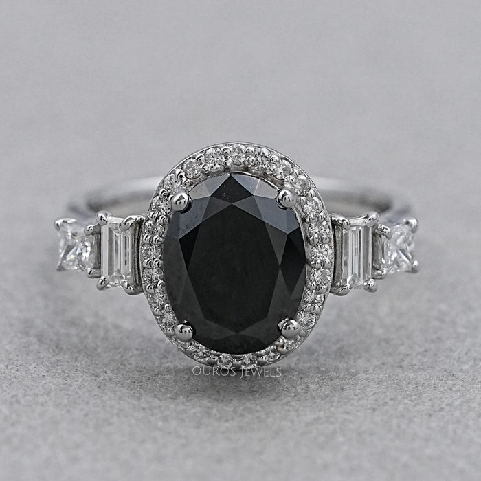 front view of black oval-cut lab diamond halo 5-stone colored engagement ring