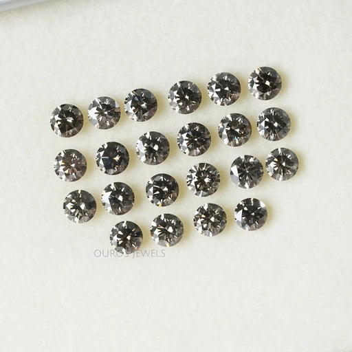 front view of black round shaped lab made diamonds