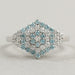 top view of fancy blue round cut cluster lab diamond engagement ring