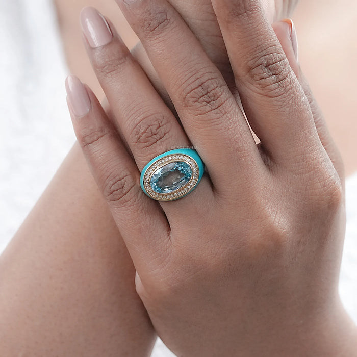 east-west oval lab diamond blue topaz enamel cocktail ring on model's finger