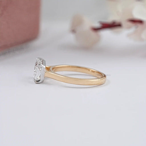 side view of east west radiant cut diamond solitaire wedding ring