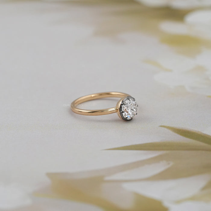 right view of black coated old eauropean round diamond solitaire wedding ring  