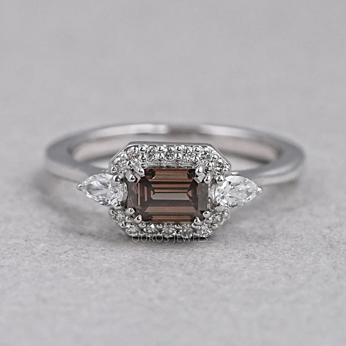 front view of chocolate emerald-cut diamond three-stone colored engagement ring