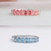 front view of pink and blue oval-cut seven stone lab diamond wedding bands