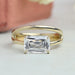 top view of east west criss cut diamond two yellow gold band wedding ring