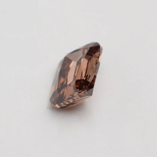 side view of criss cut man made champagne loose diamond