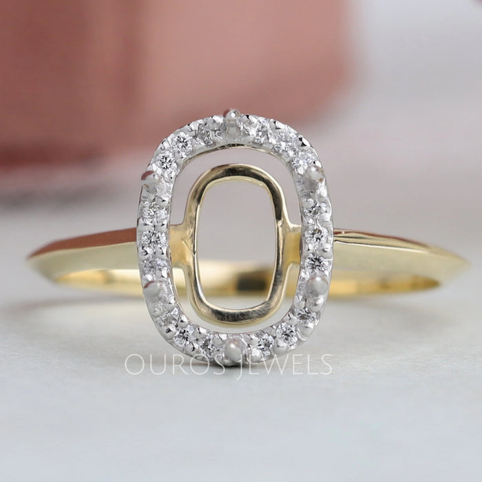 front view of cushion-cut semi-mount halo engagement ring with yellow gold band