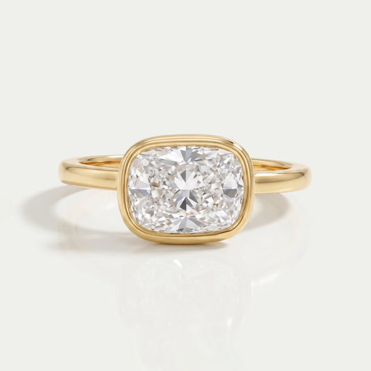 East West Cushion Diamond Bezel Set Solitaire Ring