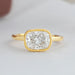 top view of east west cushion cut lab diamond bezel set engagement ring