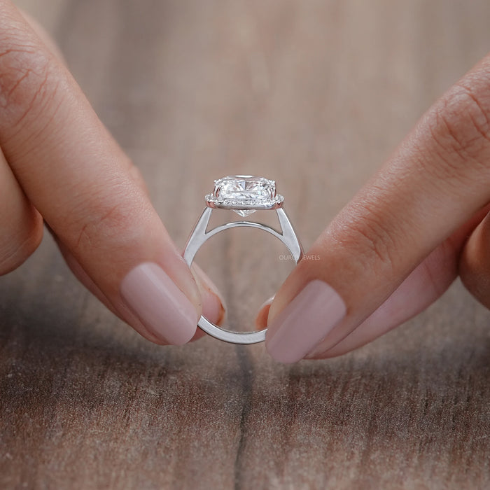close view of cushion cut lab diamond halo engagement ring