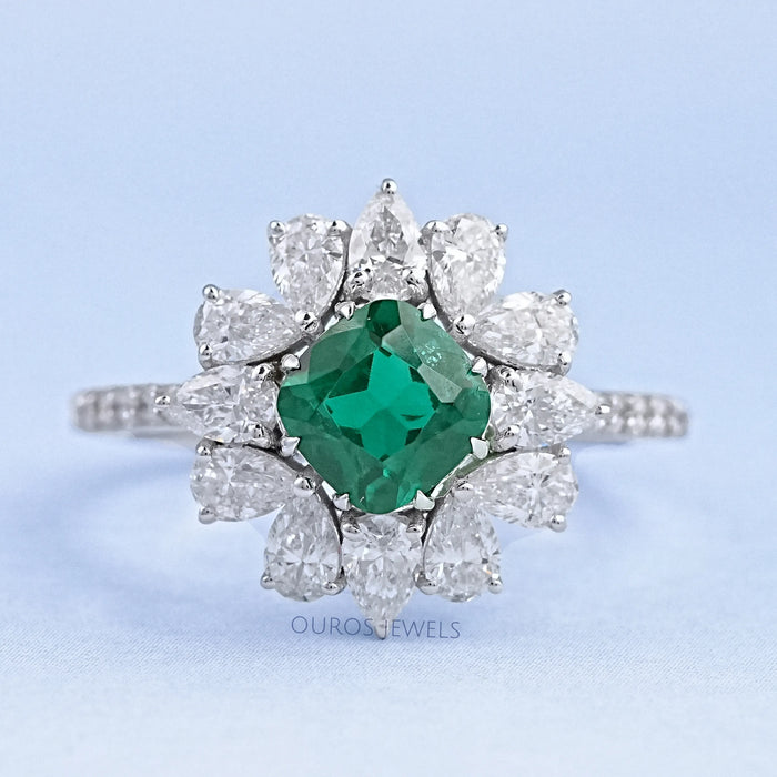 cushion cut gemstone with pear diamond halo engagement ring's front view