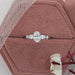 oval and pear cut lab diamond five stone engagement ring in jewelry box