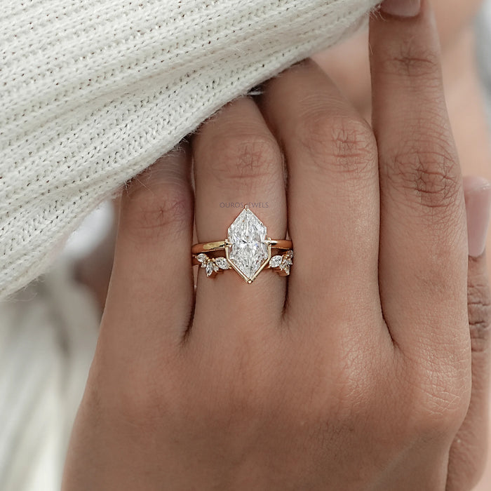 dutch marquise cut lab diamond wedding ring set with yellow gold band in finger