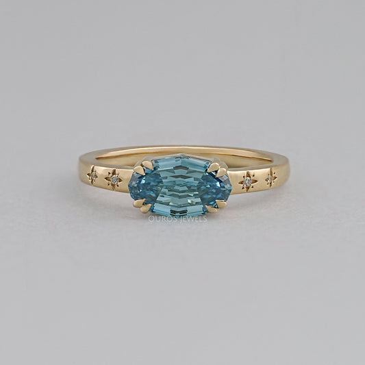 East-West Blue Step Cut Oval Accent Diamond Ring