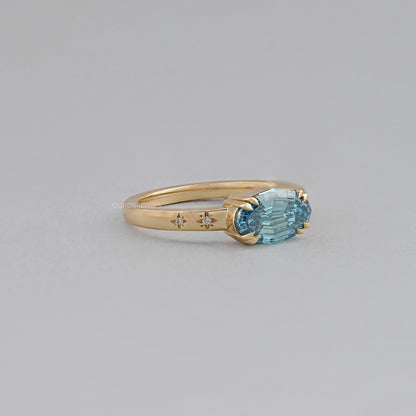 East-West Blue Step Cut Oval Accent Diamond Ring