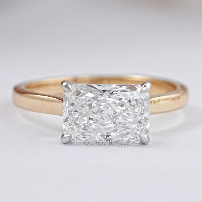 front view of east west radiant cut diamond solitaire wedding ring