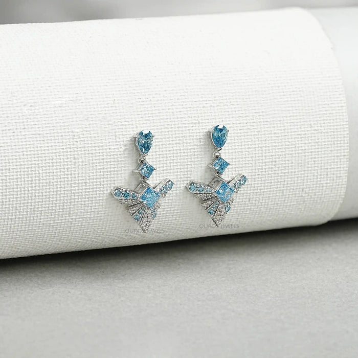 Boucles d'oreilles pendantes en diamant géométrique bleu