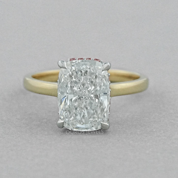 front view of cushion-cut lab diamond pink hidden halo solitaire colored wedding band