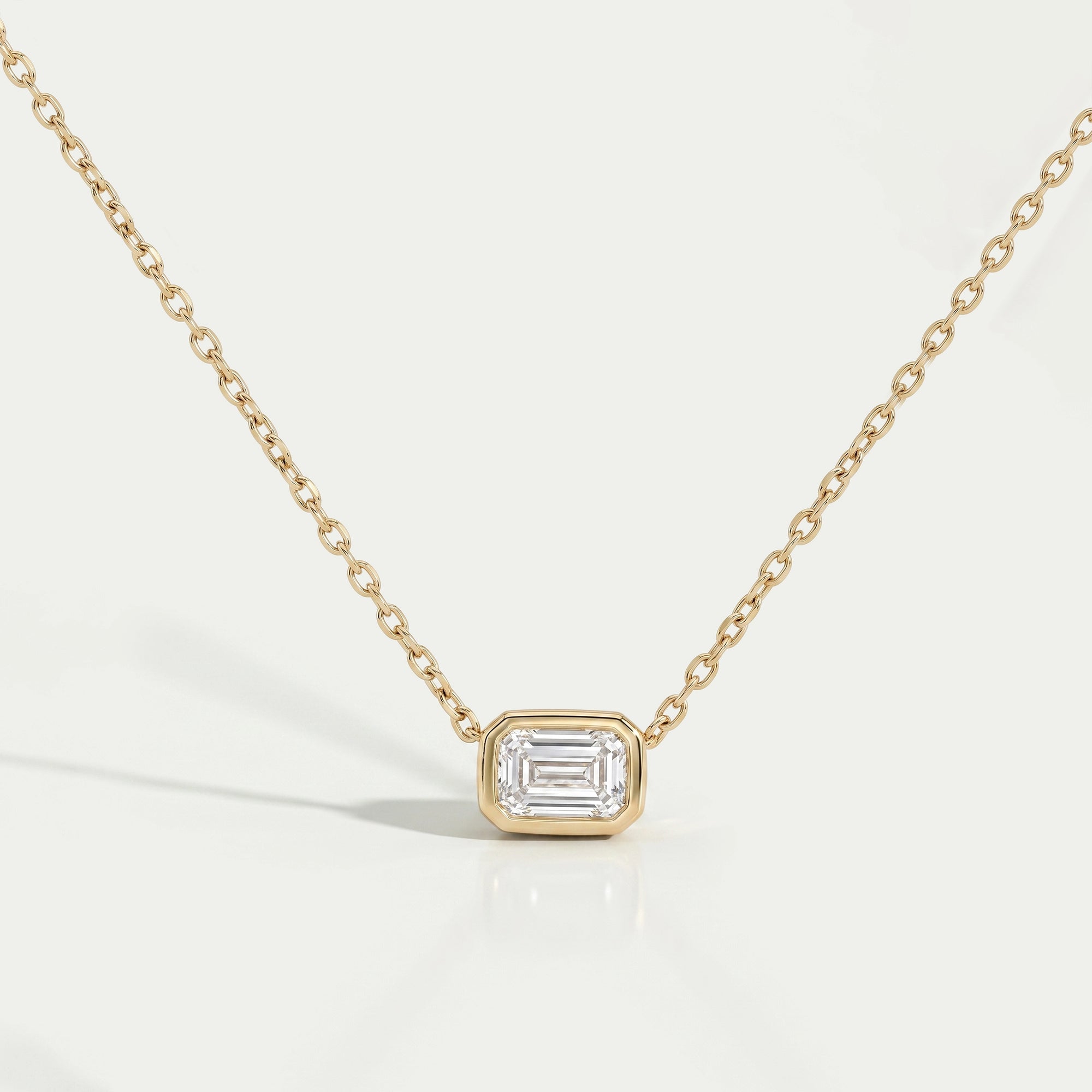 Bezel Set Emerald Cut Lab Diamond Solitaire Pendant Necklaces