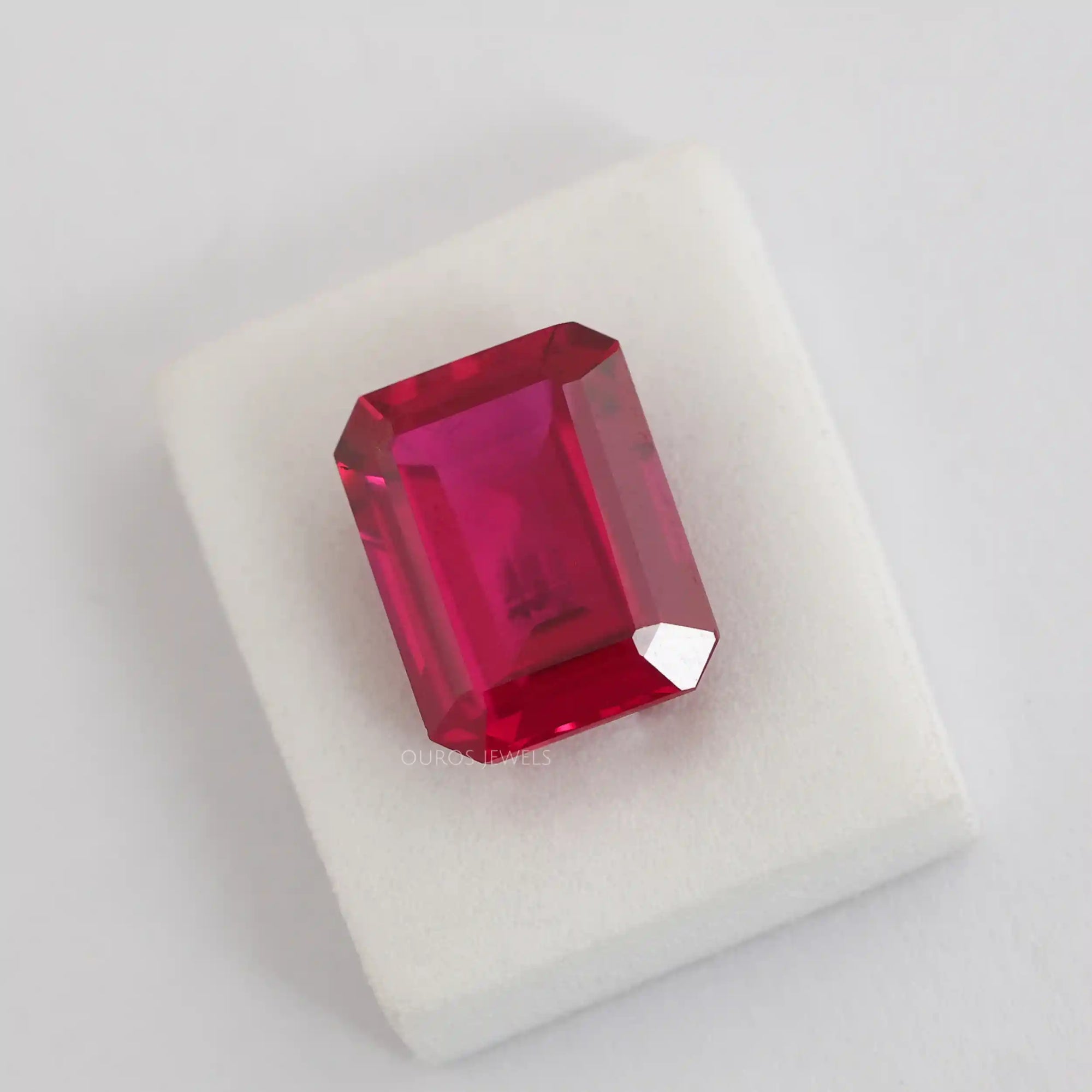 9.27 Carat Emerald Shape Light Red Ruby Gemstone