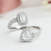 top view of showing emerald & trilliant cut lab diamond halo bypass ring