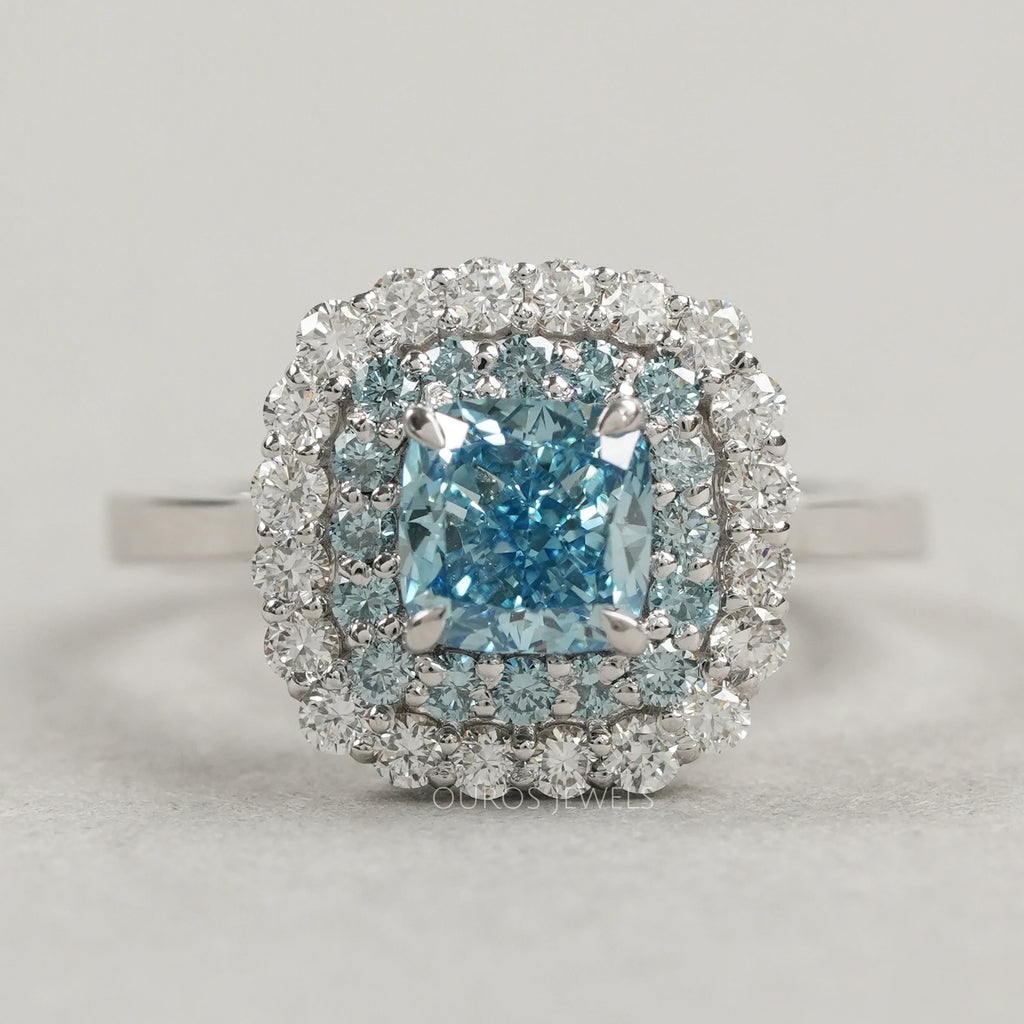 front view of fancy blue cushion cut lab diamond double halo wedding ring