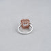 back view of pink cushion-cut lab diamond halo 3 stone colored engagement ring