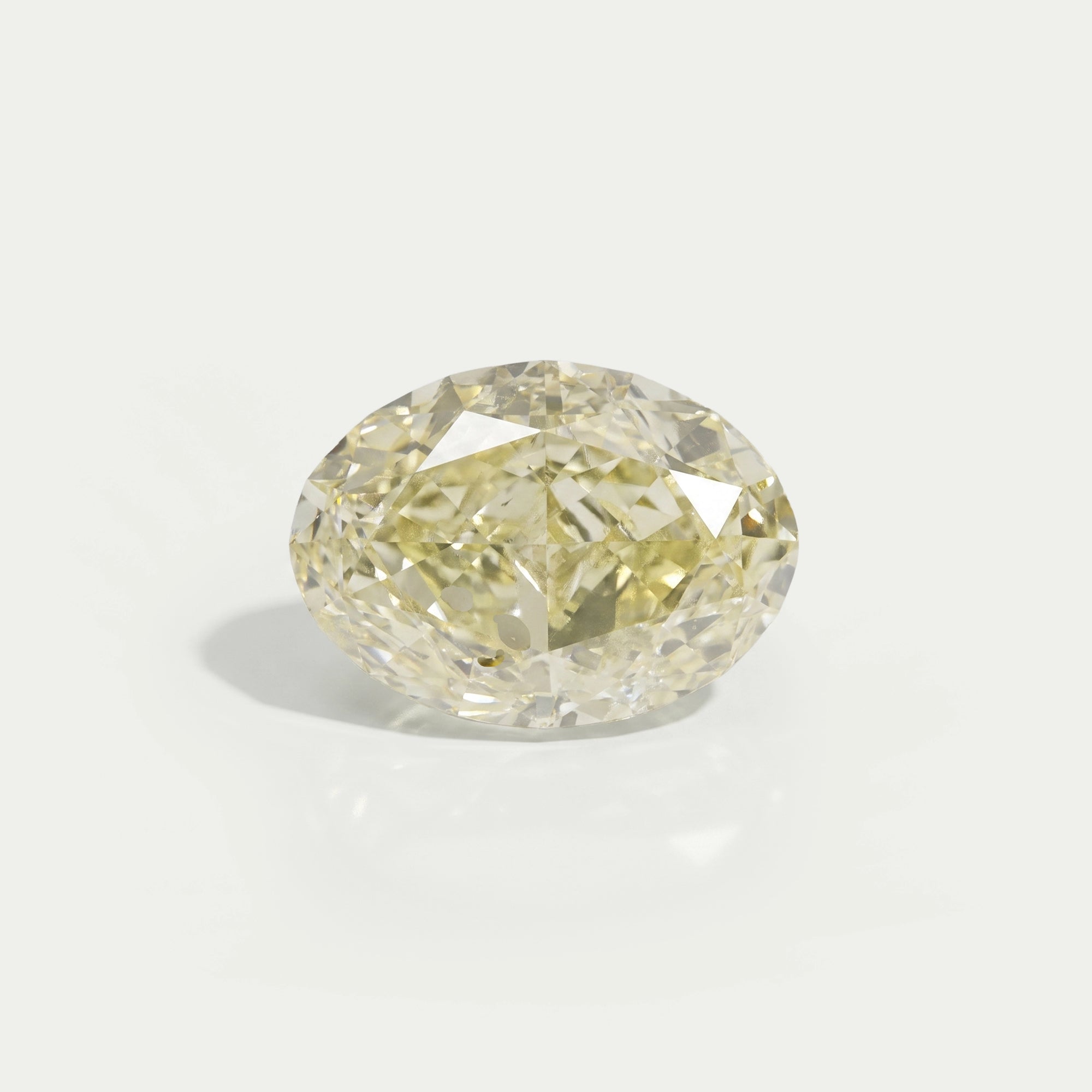 Fancy Yellow Modified Oval Cut Loose Diamond