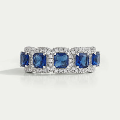 Bague halo de diamants à cinq pierres bleues taille Asscher