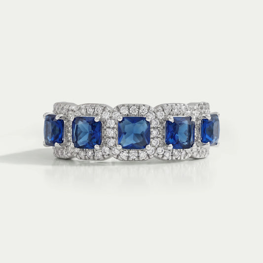 Bague halo de diamants à cinq pierres bleues taille Asscher