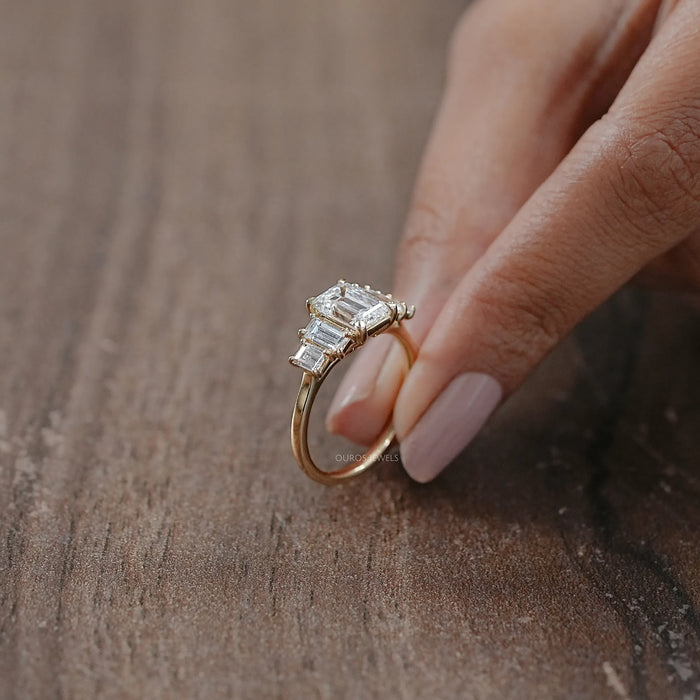 side view of emerald and baguette cut lab diamond five stone engagement ring