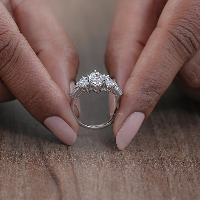 close view of marquise cut diamond five stone engagement ring with white gold band