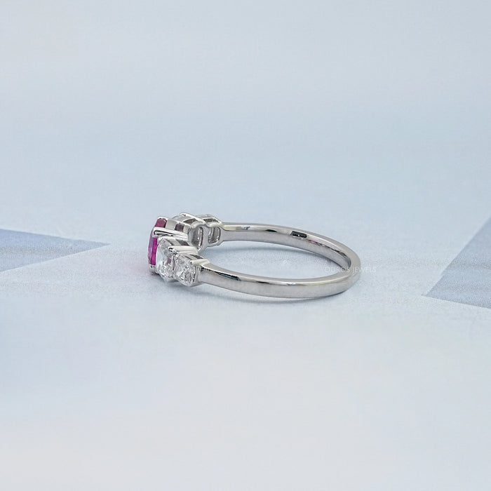 left side view of pink square cushion cut lab diamond five stone engagement ring