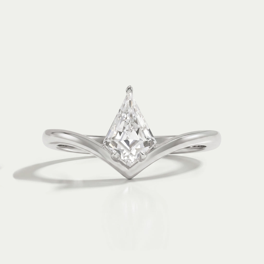 Kite Cut Curved Solitaire Engagement Ring