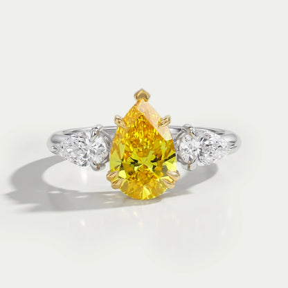 Bague à trois diamants taille poire jaune de laboratoire