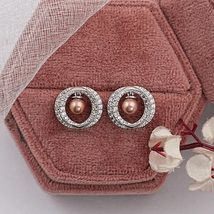 Boucles d'oreilles rondes avec halo de diamants et perles