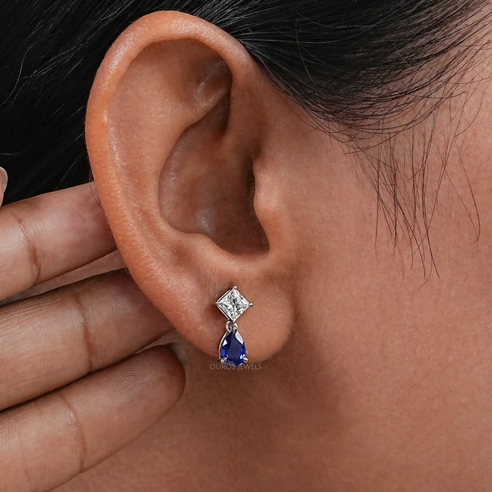 Boucles d'oreilles à deux pierres en saphir poire et diamant princesse