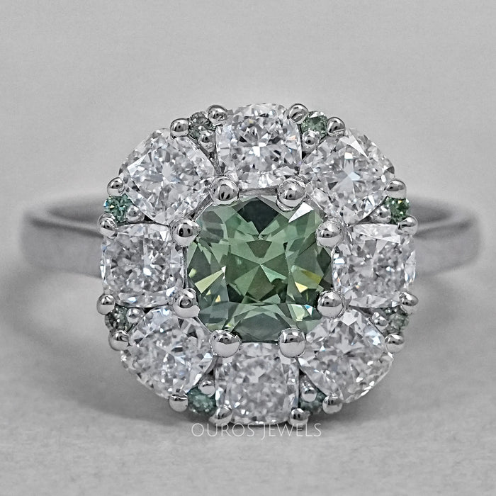 top view of green cushion cut lab diamond halo engagement ring