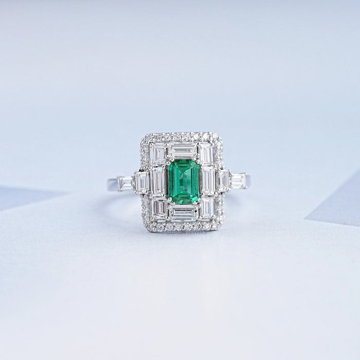 Bague en pierres précieuses avec halo de diamants ronds et baguettes