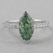 front view of green marquise-cut lab diamond solitaire accent wedding ring