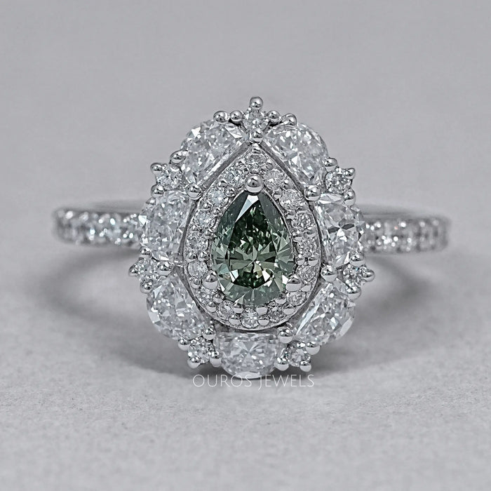 front view of green pear cut surround double halo diamond engagement ring