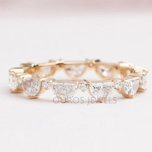 front view of half moon and round lab grown diamond eternity band yellow gold